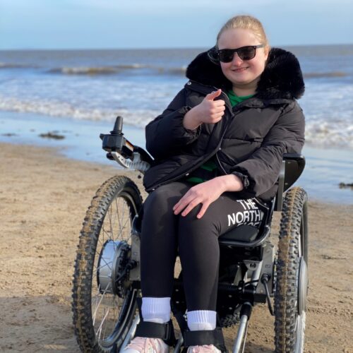 Olivia's all-terrain wheelchair means she can visit the beach for the first time in a decade